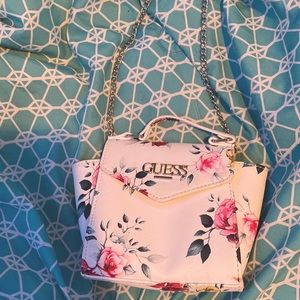 A small guess crossbody purse